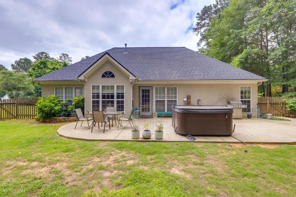 Fayetteville Retreat with Hot Tub and Fenced Yard